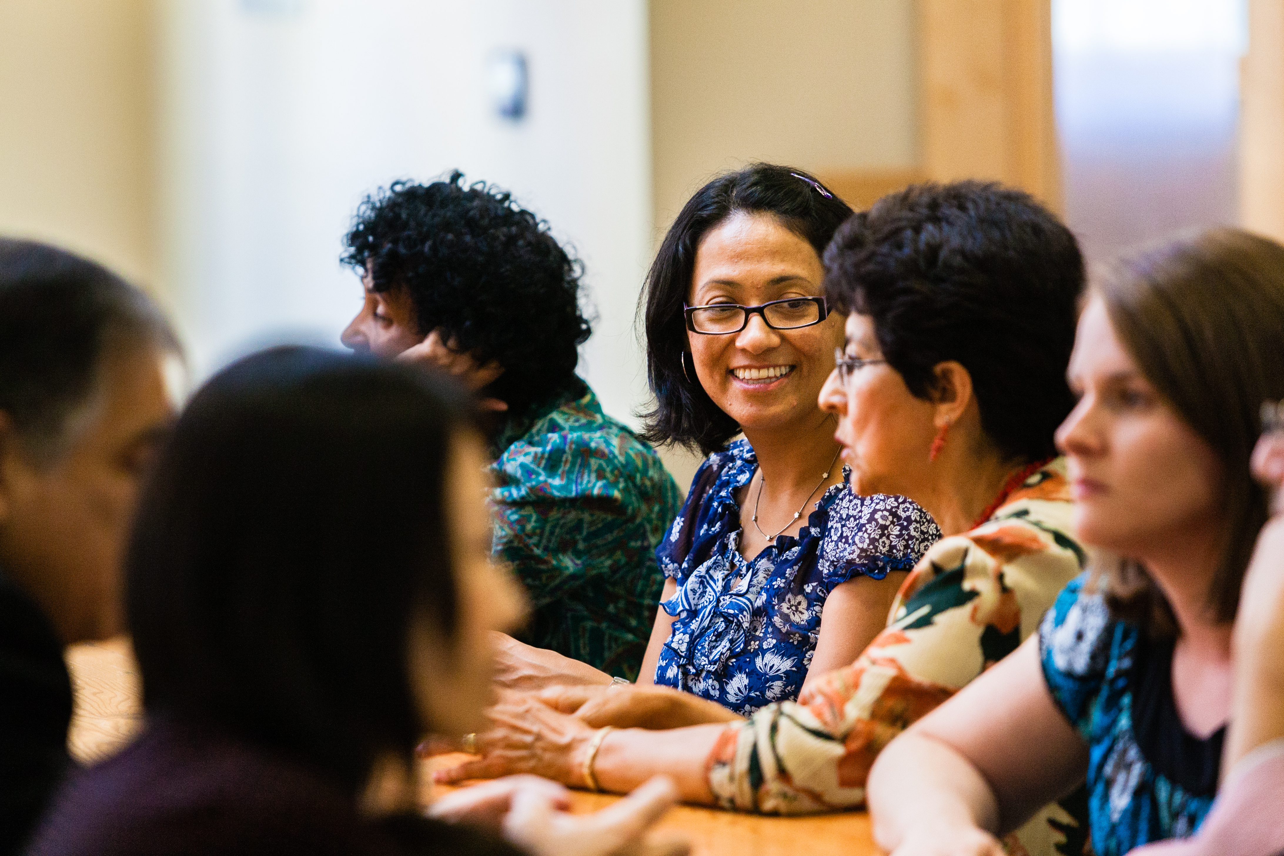 A group of people engages in a lively discussion.