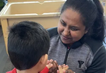 Educator with child