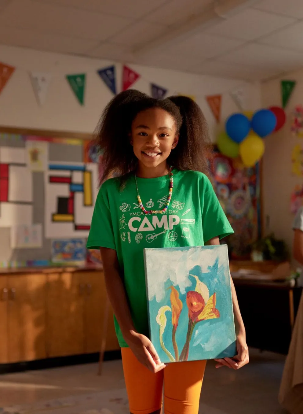 Girl at YMCA camp, in classroom