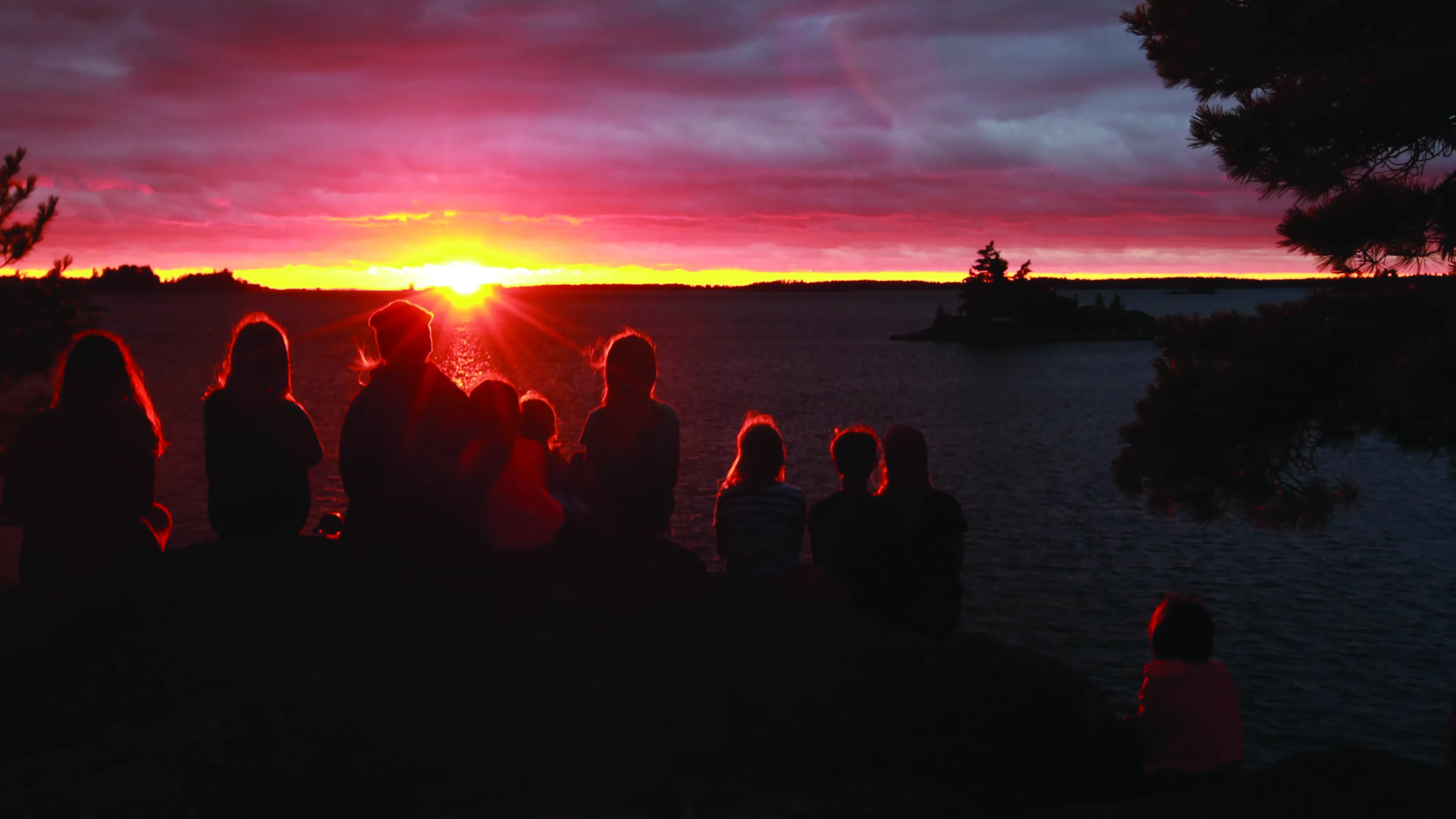 Campers enjoying the beautiful sunset at CQE; memories that last a lifetime.