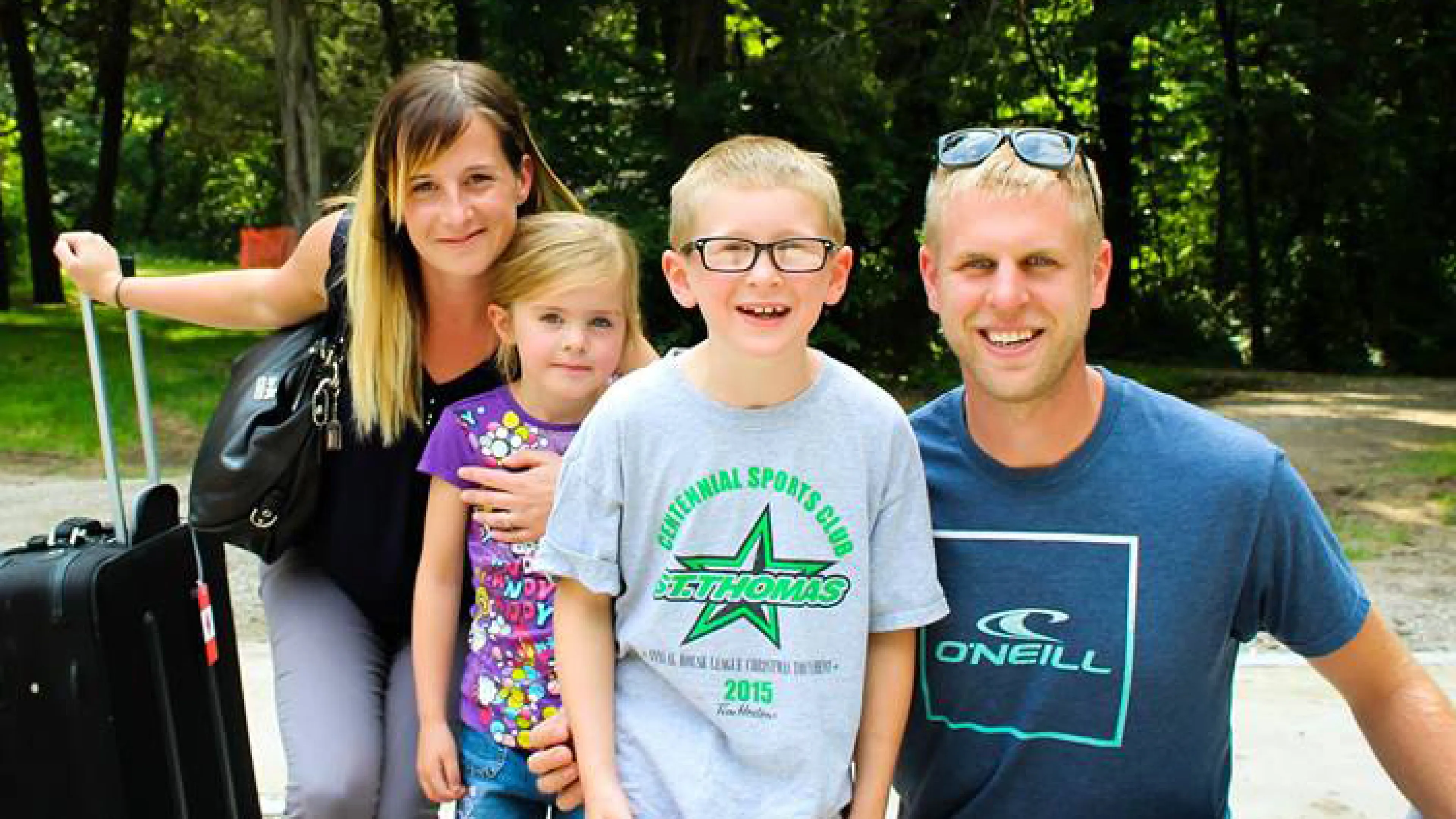 Family arriving at Camp Henry