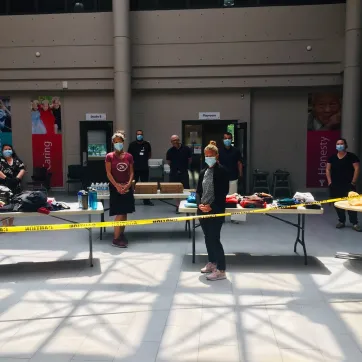 Staff members from the Centre Branch in London set up hygiene facilities open to the public.