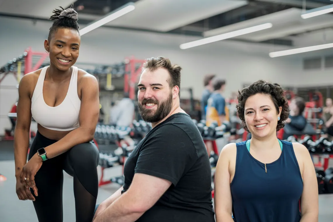 three people exercising